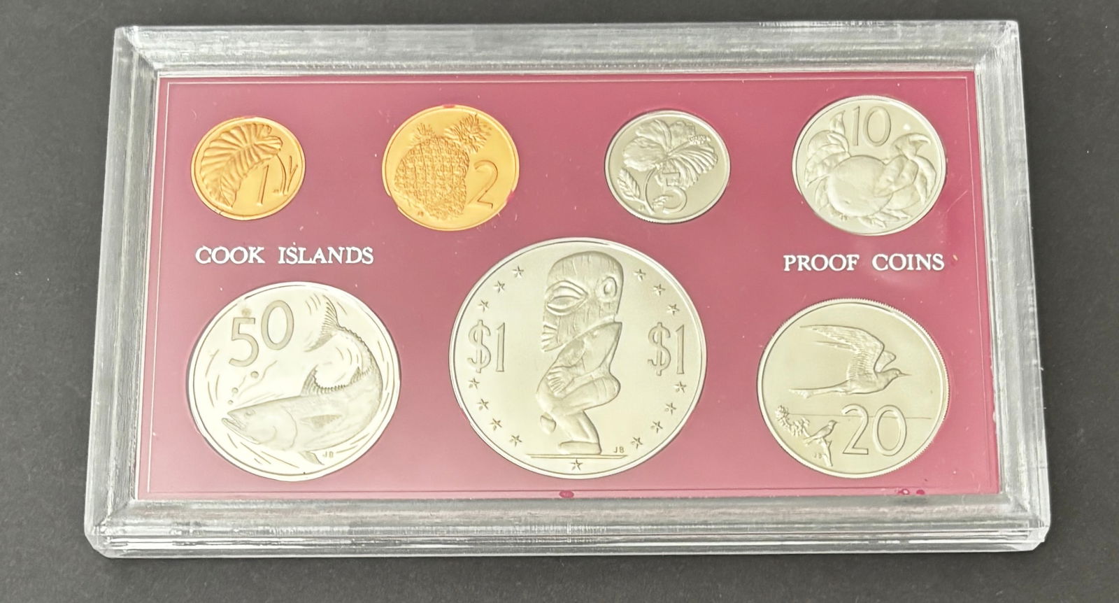 1972 Cook Islands Proof Coin Set 7 Coins Original Holder: Official 1972 Cook Islands proof coin set featuring seven coins with Queen Elizabeth II portrait obverses and island wildlife and cultural motif reverses, including 1, 2, 5, 10, 20, $1 and 50 denomina