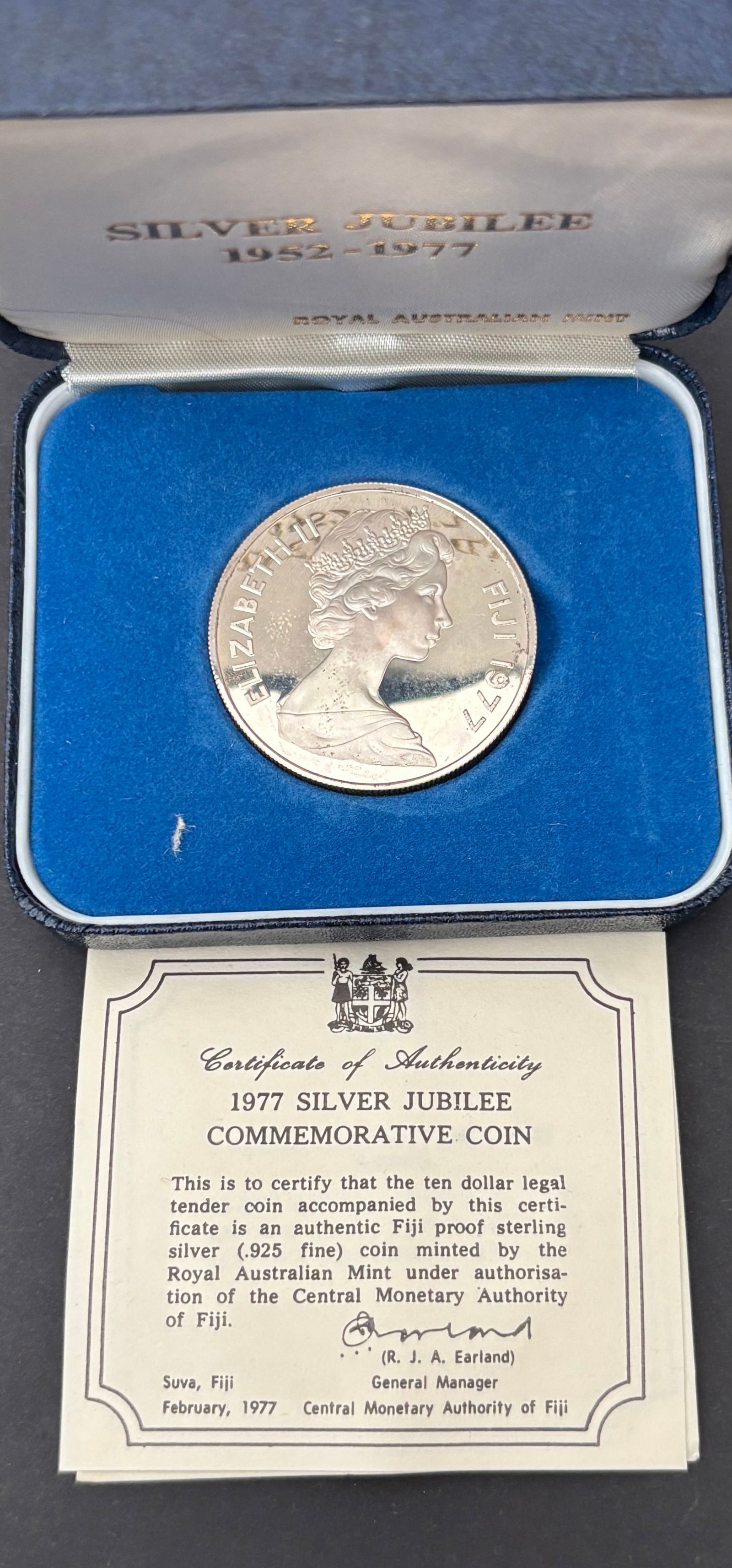 1977 Fiji Silver Jubilee $10 Sterling Silver Proof Coin Royal Australian Mint With Box And: 1977 Fiji Silver Jubilee commemorative ten dollar proof coin struck in sterling silver (.925 fine) by the Royal Australian Mint under authorization of the Central Monetary Authority of Fiji, issued to