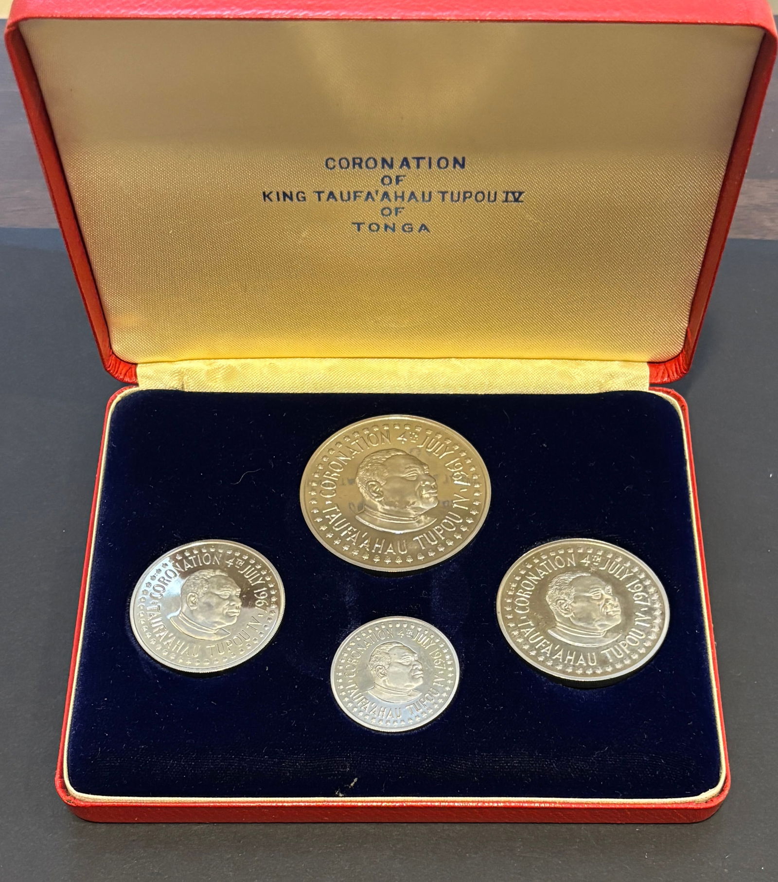 1967 Tonga Coronation King Taufa’ahau Tupou IV Proof Coin Set: Coronation of King Taufa’ahau Tupou IV of Tonga commemorative proof coin set dated July 4, 1967, presented in original fitted case. Four-coin set includes pa’anga and seniti denominations featurin