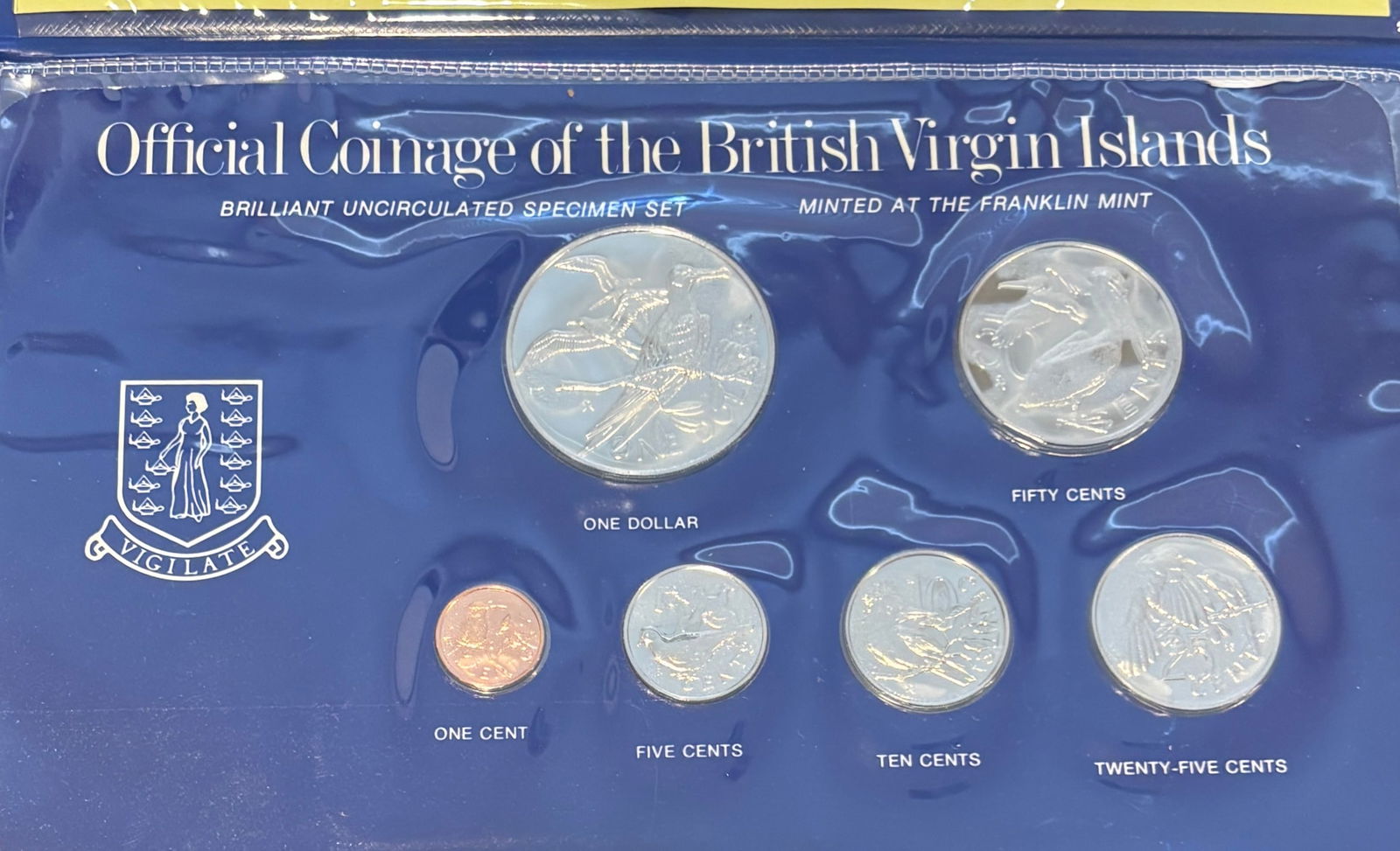 British Virgin Islands Official Coinage Brilliant Uncirculated Specimen Set Franklin Mint: Official Coinage of the British Virgin Islands brilliant uncirculated specimen set minted at The Franklin Mint. Seven-coin set including $1, 50¢, 25¢, 10¢, 5¢, and 1¢ denominations featuring Quee