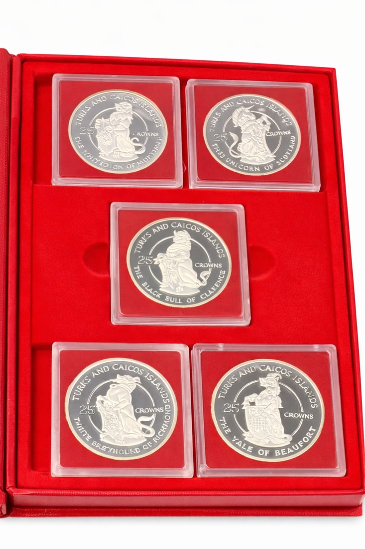 Turks & Caicos Islands Queen’s Beasts Silver Collection 1978 10-Coin Proof Set: Complete Turks and Caicos Islands “Queen’s Beasts” silver proof collection commemorating the 25th anniversary of the coronation of Queen Elizabeth II (1953-1978). Ten different 25 Crowns coi