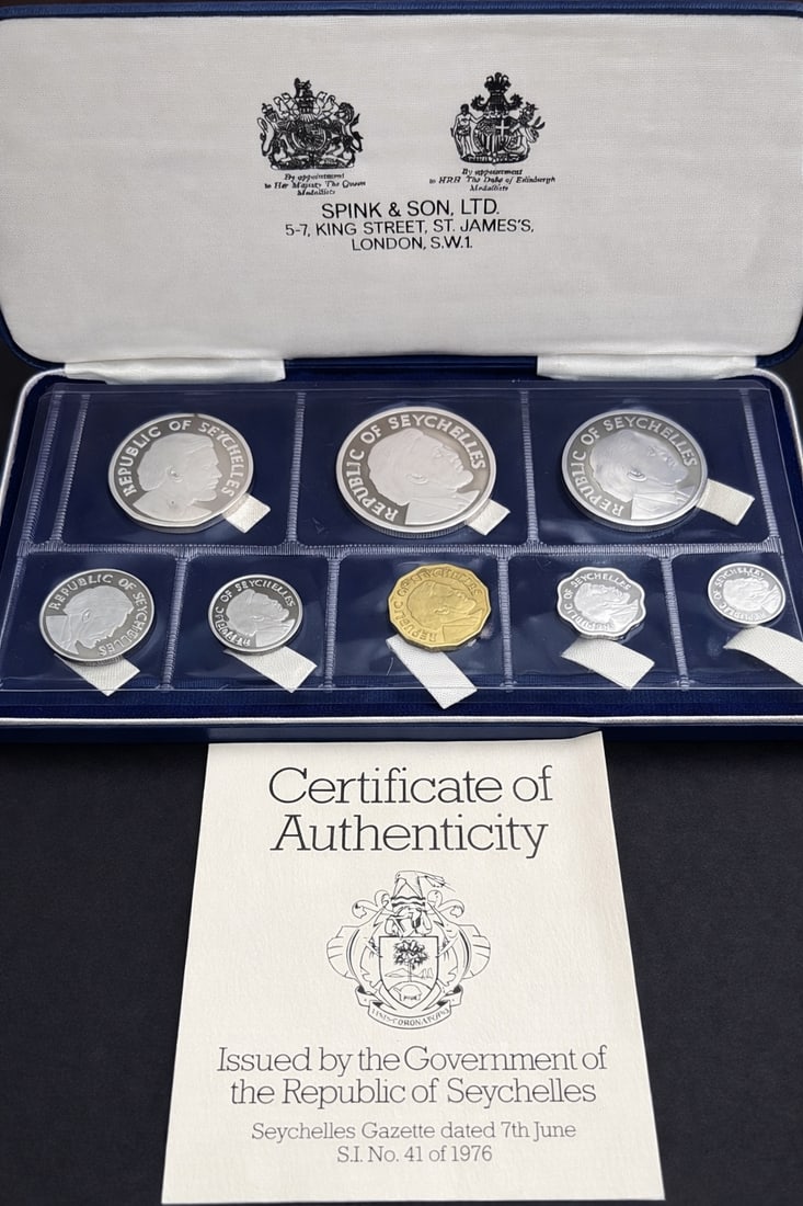 1976 Republic of Seychelles Independence Proof Coin Set Spink & Son London: 1976 Republic of Seychelles Independence proof coin set issued by the Government of Seychelles and housed in the original Spink & Son Ltd. London presentation case with certificate (S.I. No. 41 of 197
