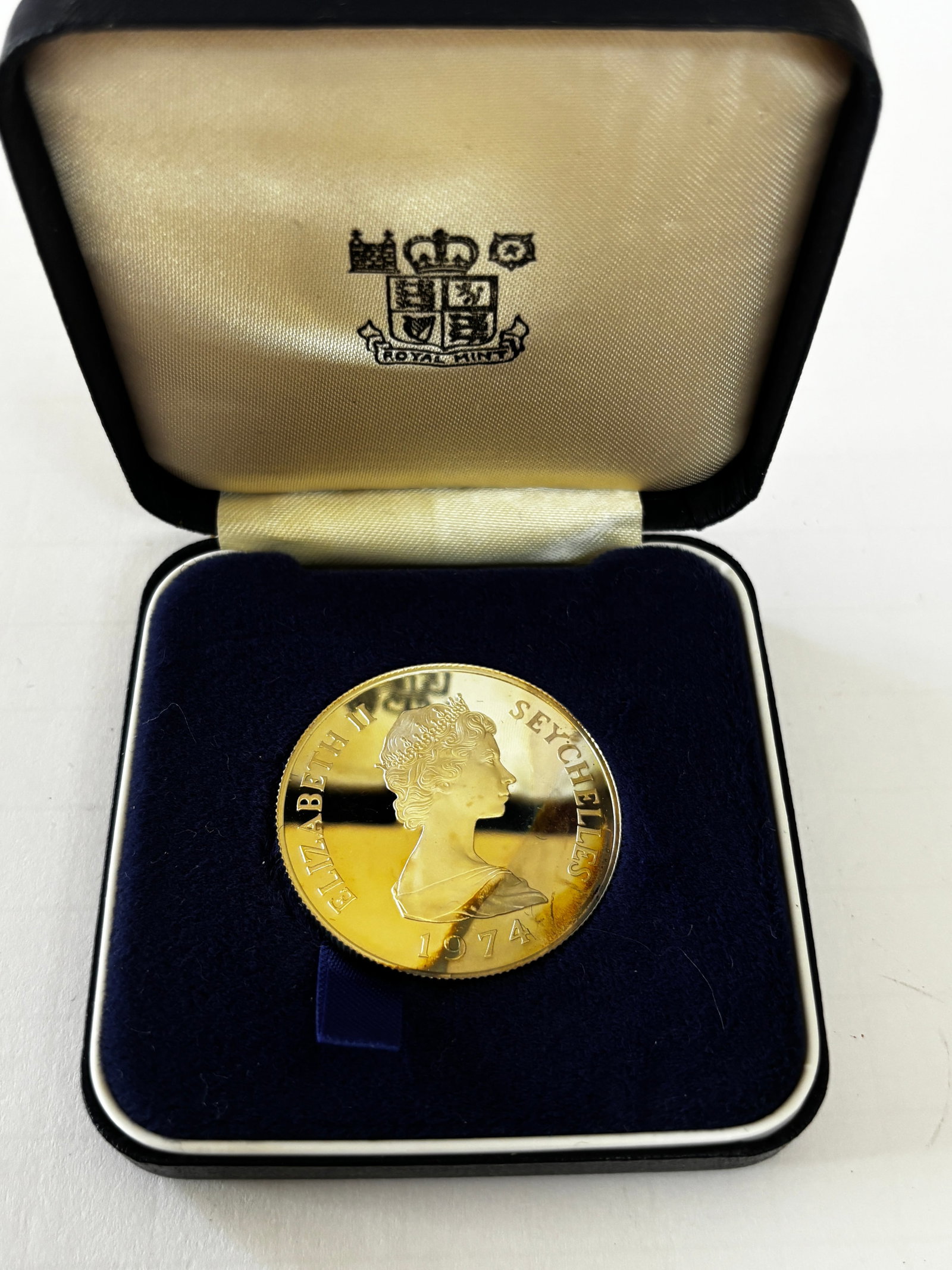1974 Seychelles Gold Proof 10 Rupees: 1974 Seychelles 10 Rupees gold proof coin featuring sea turtle reverse and Queen Elizabeth II portrait on obverse, struck by the Royal Mint in .900 fine gold with proof finish, approximately 3.99