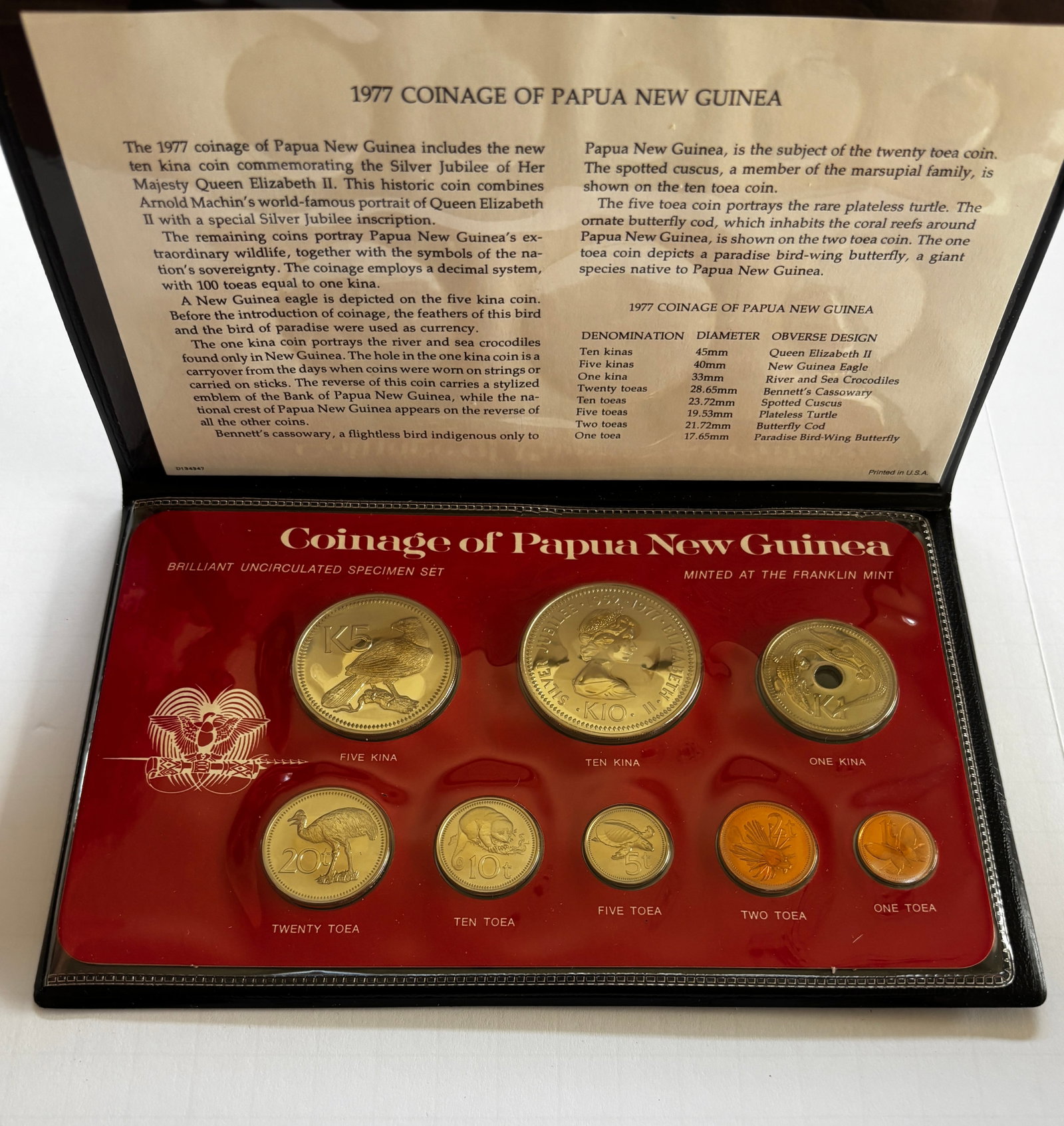 1977 Papua New Guinea Coinage Specimen Set: 1977 Coinage of Papua New Guinea brilliant uncirculated specimen set minted by the Franklin Mint, featuring seven coins from 1 toea through 10 kina denominations in original presentation folio. Includ