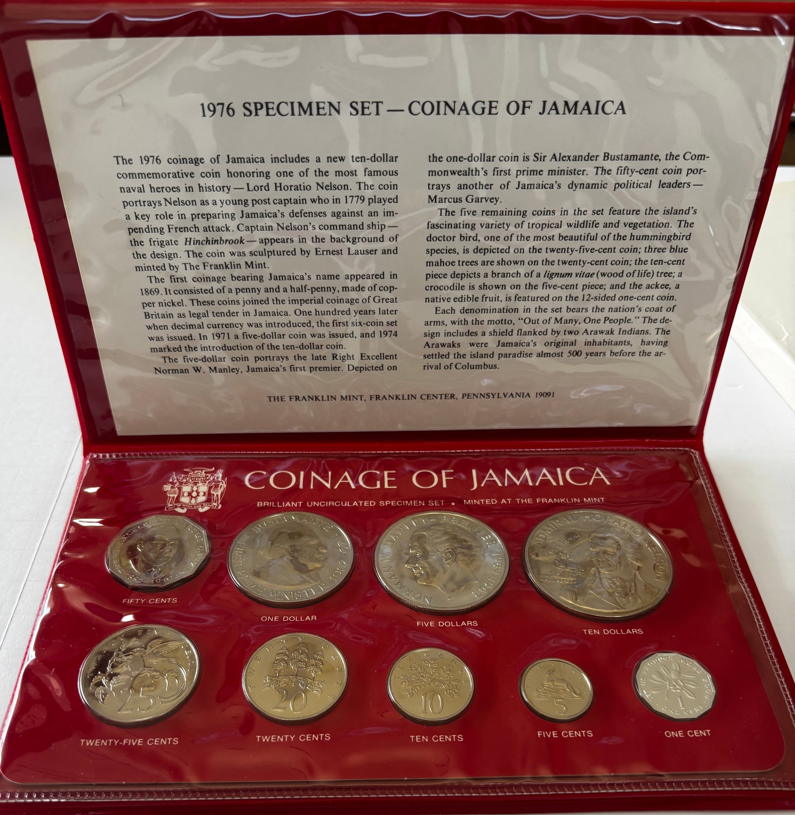 1976 Jamaica Brilliant Uncirculated Coin Set: 1976 Coinage of Jamaica brilliant uncirculated specimen set minted by the Franklin Mint, featuring eight coins from 1 cent through 10 dollars in original presentation folio. Includes Lord Horatio