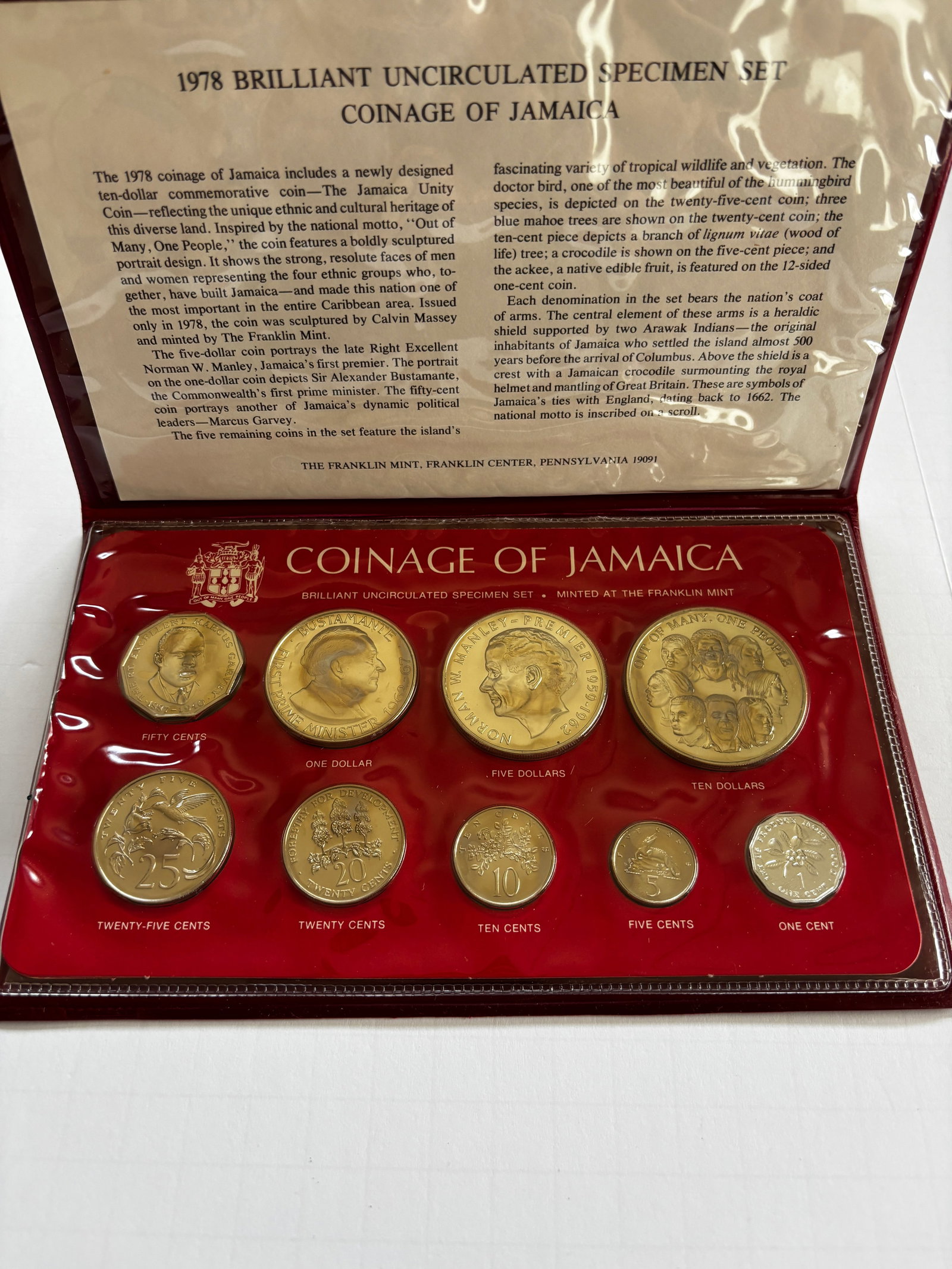1978 Jamaica Brilliant Uncirculated Coin Set: 1978 Coinage of Jamaica brilliant uncirculated specimen set minted by the Franklin Mint, featuring eight coins from 1 cent through 10 dollars in original presentation folio. Includes the Jamaica Unity