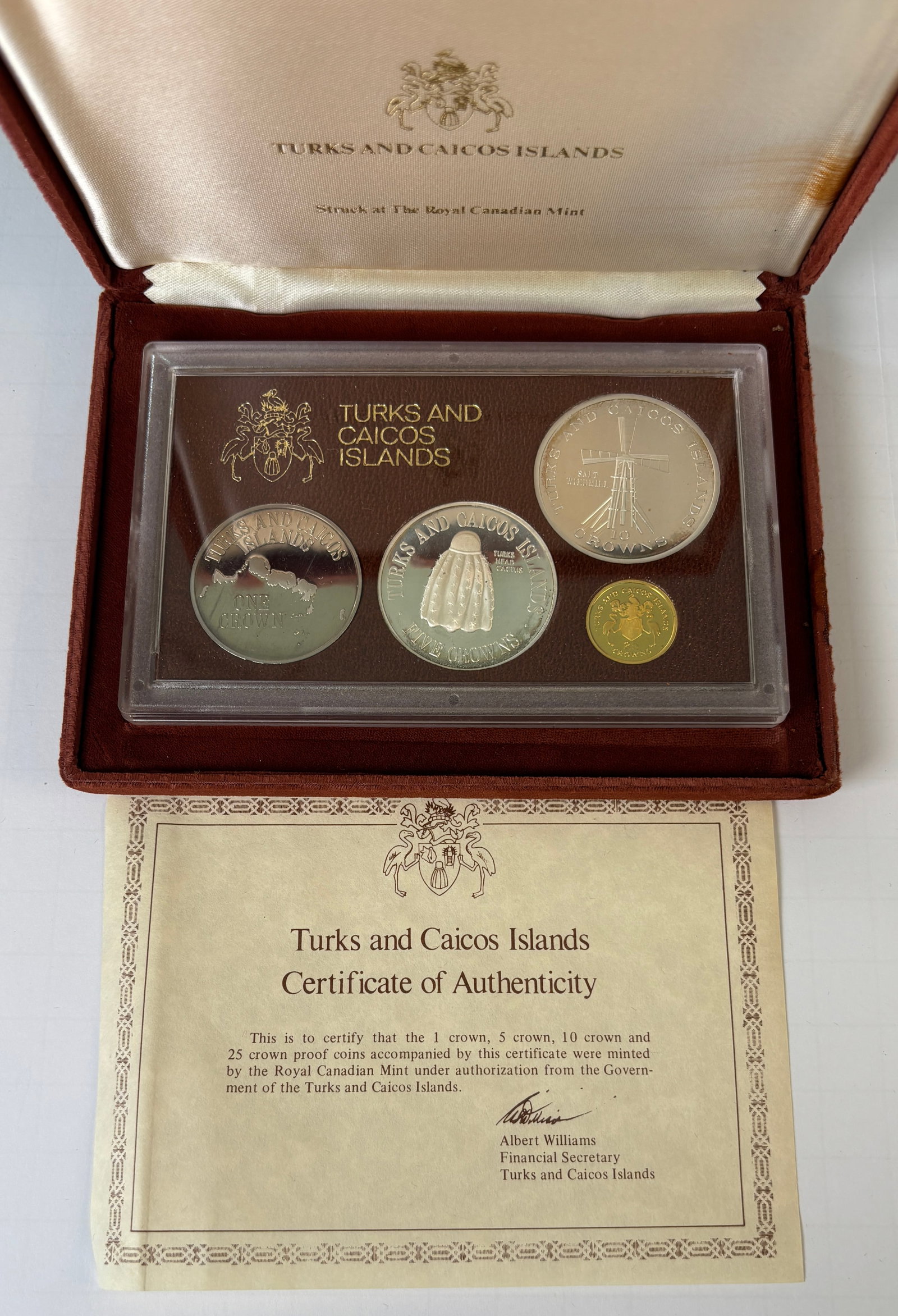 1976 Turks And Caicos Islands Proof Coin Set Royal Canadian Mint: 1976 Turks and Caicos Islands proof coin set struck by the Royal Canadian Mint, comprising four proof coins including 25 crowns, 10 crowns, 5 crowns, and 1 crown denominations featuring marine and