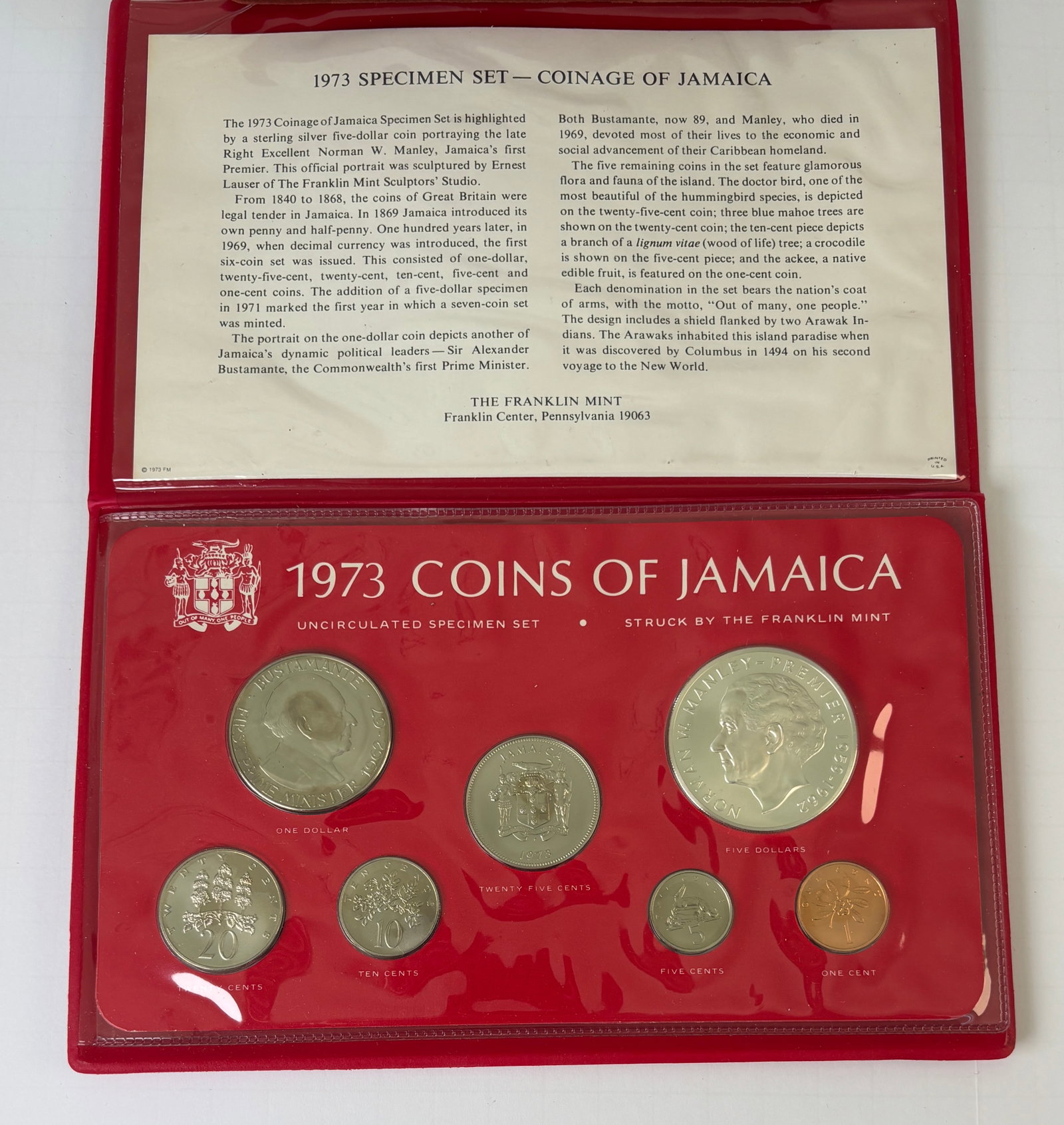 1973 Jamaica Specimen Coin Set Franklin Mint 7 Coin Uncirculated: 1973 Jamaica specimen coin set issued by the Franklin Mint, comprising seven uncirculated coins including $5, $1, 25c, 20c, 10c, 5c, and 1c denominations, featuring portraits of Norman Manley and Sir 