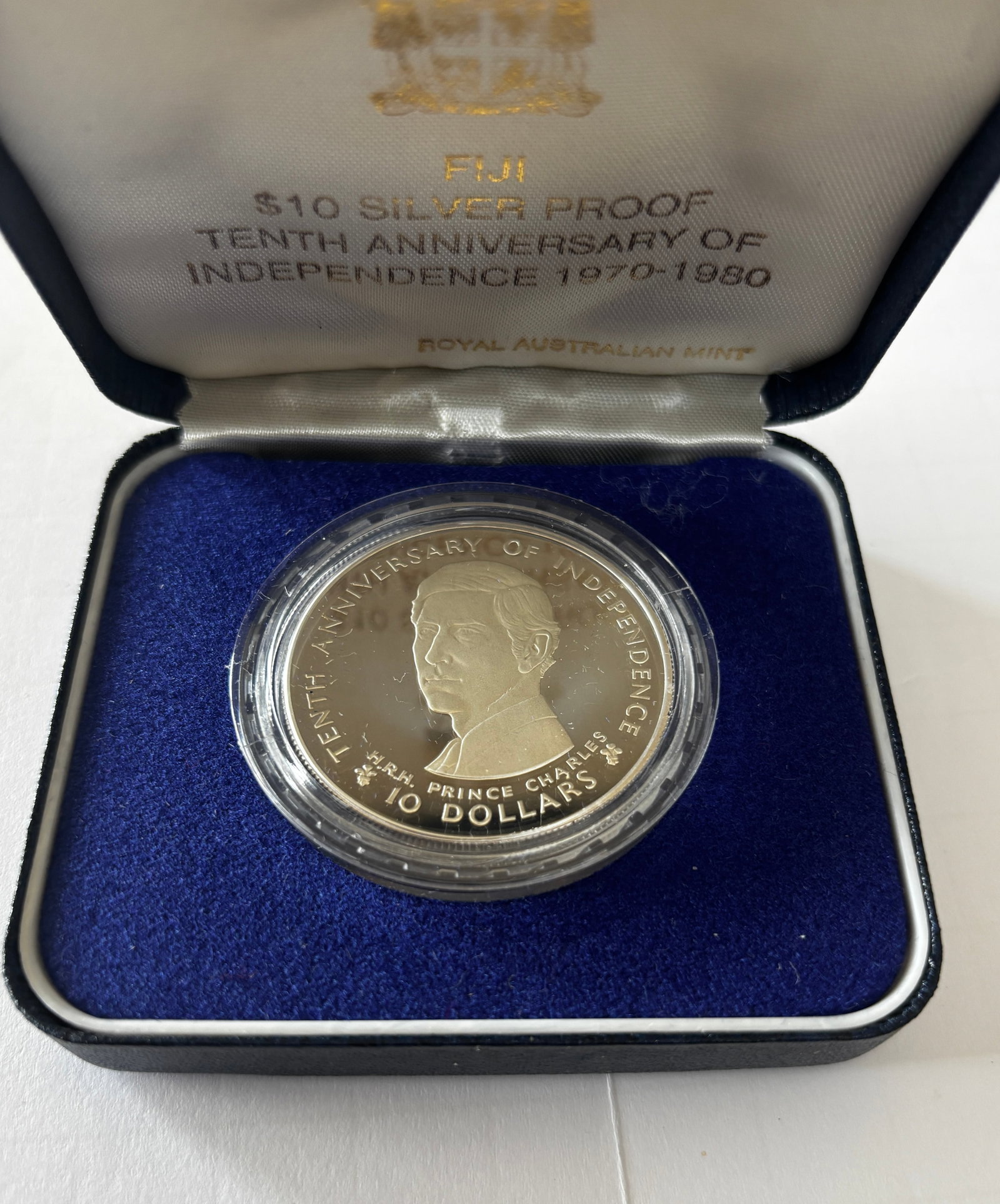 1980 Fiji $10 Silver Proof Independence Coin: 1980 Fiji $10 silver proof coin commemorating the tenth anniversary of independence (1970–1980), issued by the Royal Australian Mint and struck in .925 fine silver, featuring H.R.H. Prince Charles p