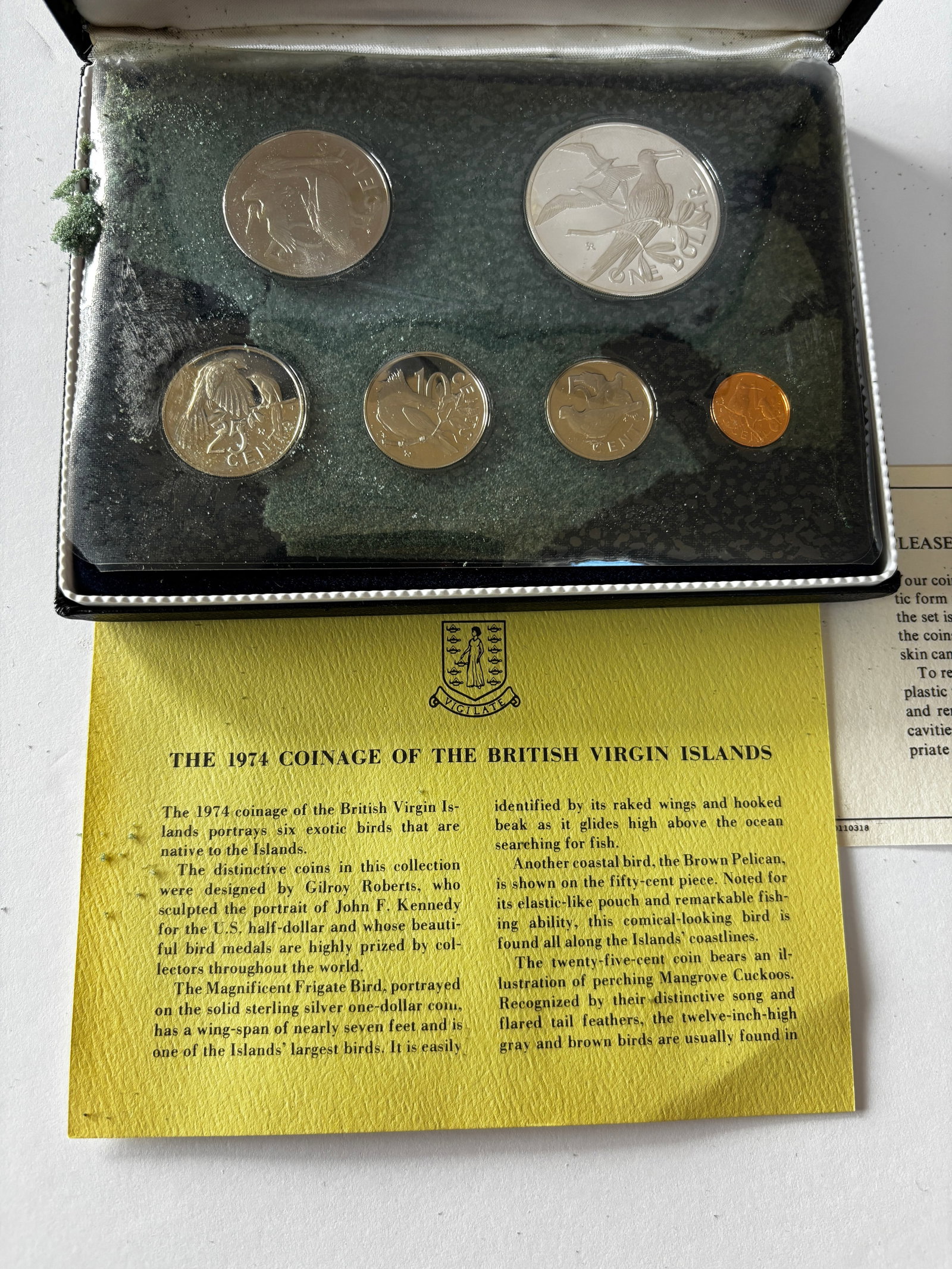 1974 British Virgin Islands Proof Set: 1974 proof coin set from the British Virgin Islands featuring six coins with native bird designs, including denominations from 1 Dollar through smaller cent values, with obverse portraits of Queen Eli