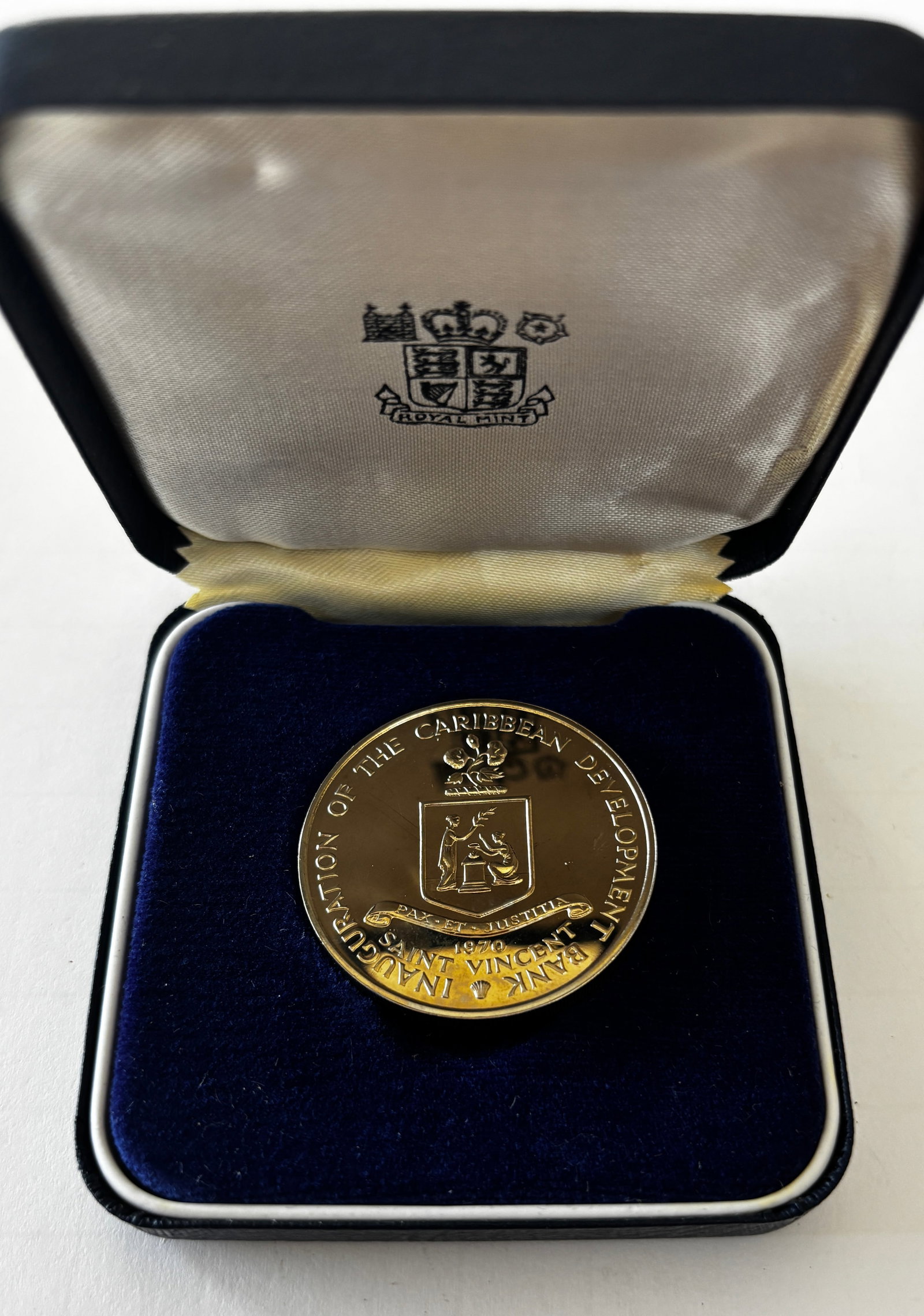 1970 Saint Vincent Caribbean Development Bank Proof Coin: 1970 Saint Vincent Caribbean Development Bank commemorative proof coin featuring the Saint Vincent coat of arms and “Inauguration of the Caribbean Development Bank” inscription to one side and