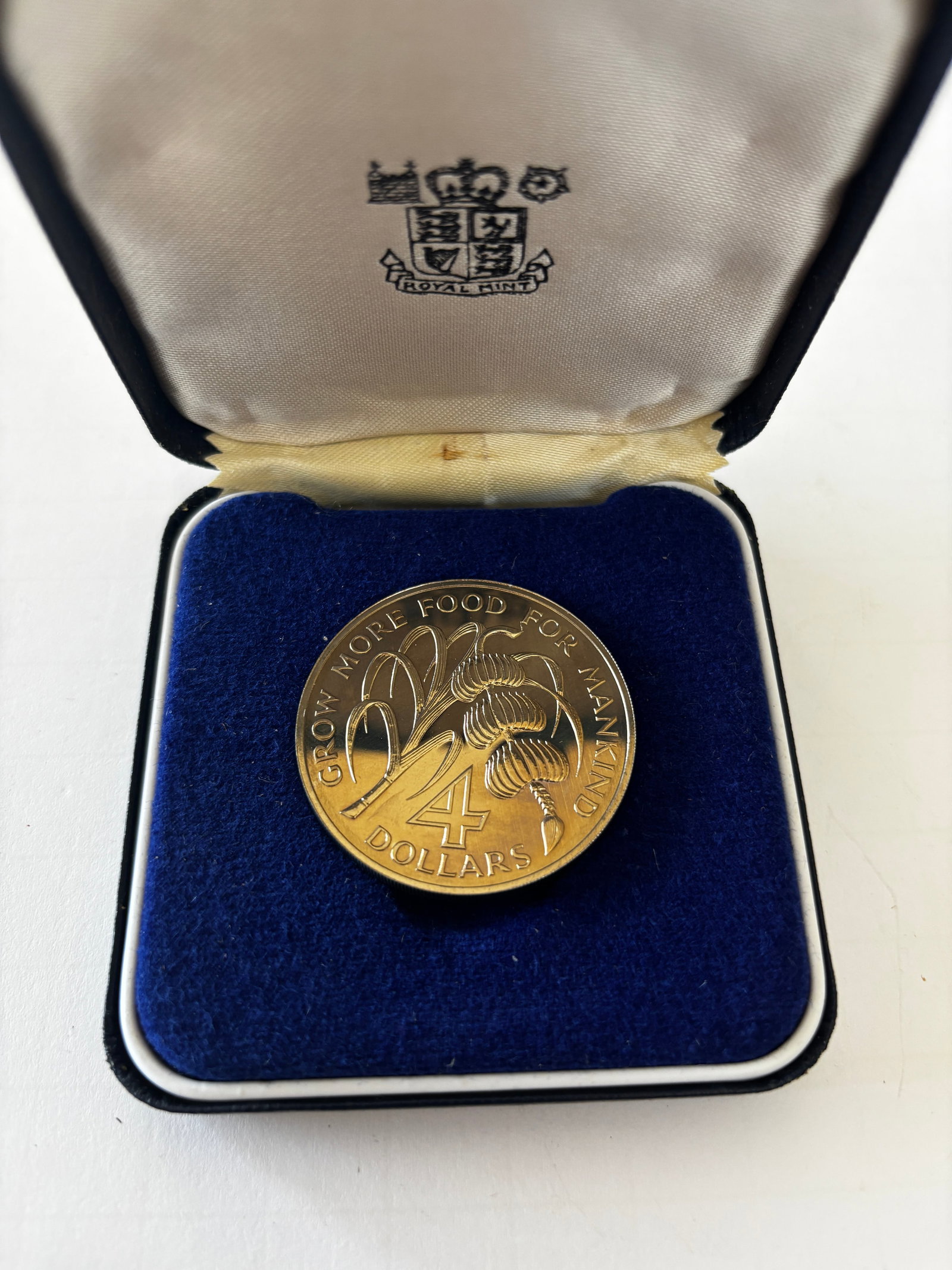 1970 St. Christopher-Nevis-Anguilla Caribbean Development Bank Proof Coin: 1970 St. Christopher-Nevis-Anguilla Caribbean Development Bank commemorative proof coin featuring the territorial coat of arms and “Inauguration of the Caribbean Development Bank” inscription 