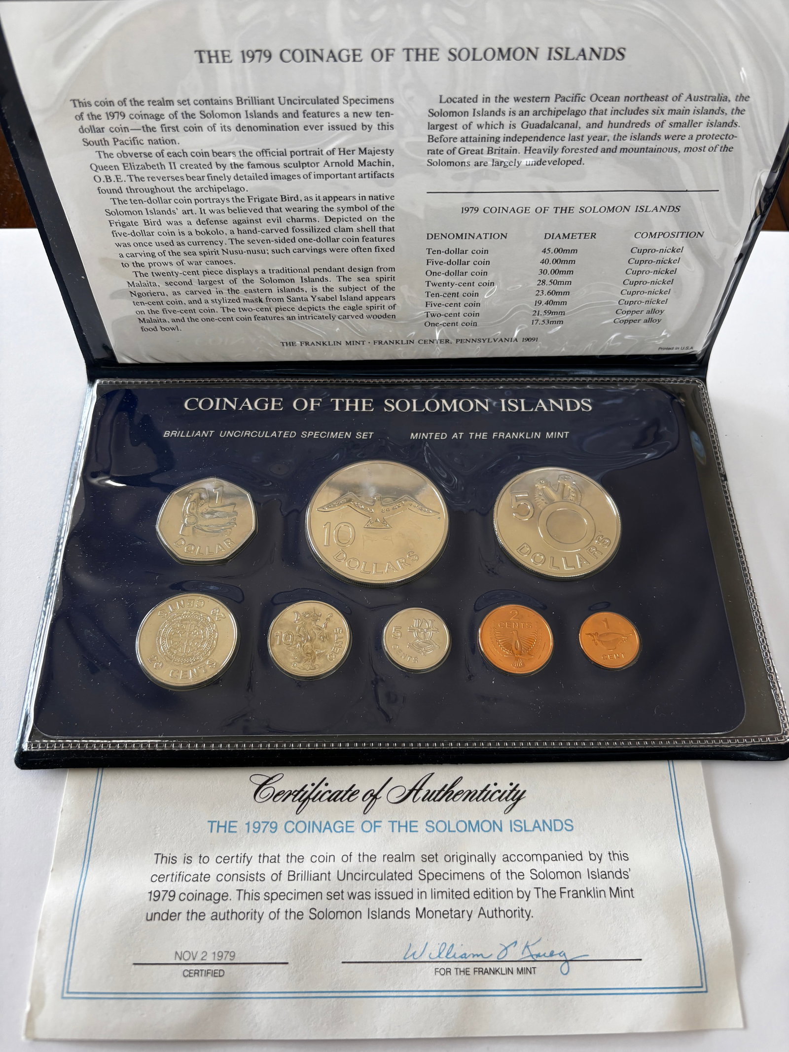 1979 Solomon Islands 8 Coin Set: 1979 eight-coin brilliant uncirculated specimen set from the Solomon Islands including 10 Dollars, 5 Dollars, 1 Dollar, 50 Cents, 20 Cents, 10 Cents, 5 Cents, and 1 Cent, featuring Queen Elizabeth II 