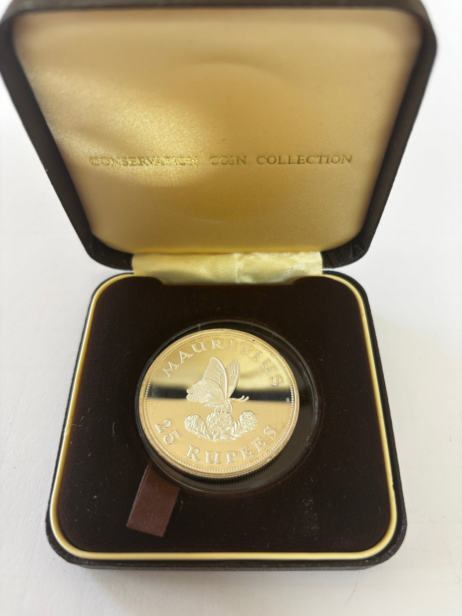 1975 Mauritius Silver Proof 25 Rupees: 1975 Mauritius 25 Rupees silver proof coin from the Conservation Coin Collection series, featuring butterfly design on reverse and Queen Elizabeth II portrait on obverse, struck in sterling silver (.9