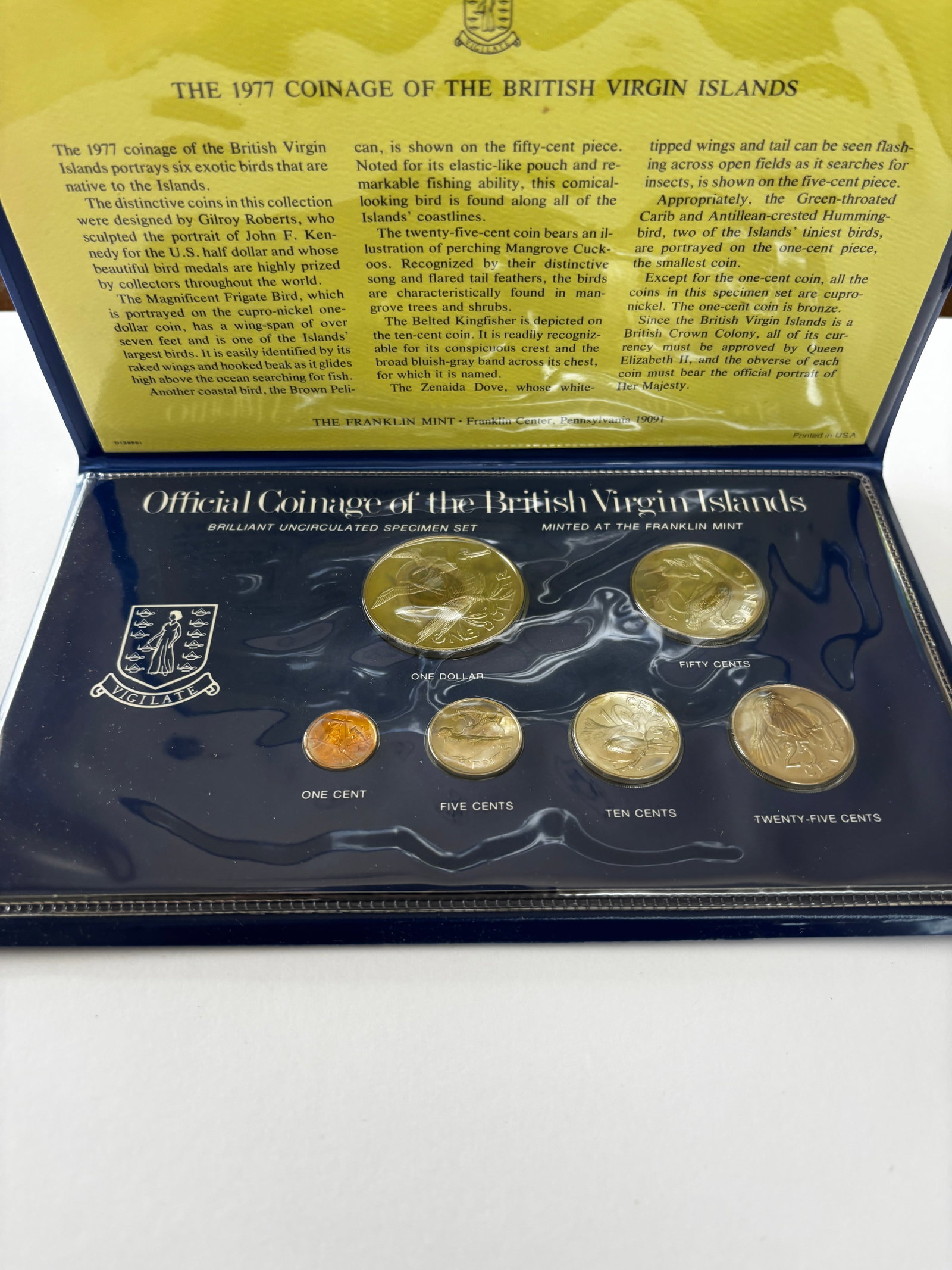 1977 British Virgin Islands Coin Set: 1977 brilliant uncirculated specimen coin set from the British Virgin Islands featuring six coins with native bird designs, including 1 Dollar, 50 Cents, 25 Cents, 10 Cents, 5 Cents, and 1 Cent, with 
