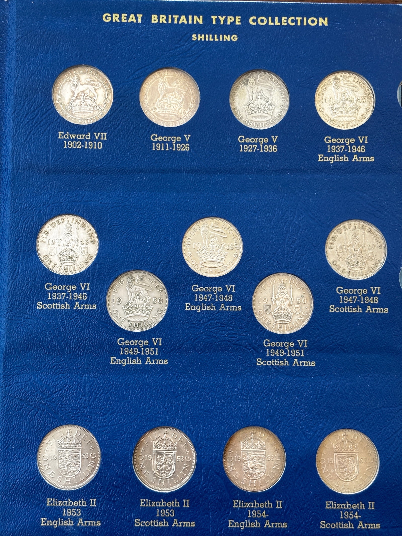 Complete Whitman Great Britain Silver Type Set Album, 1902–1960: Complete Whitman Great Britain Silver Type Set album featuring an impressive collection of British silver coinage spanning the reigns of Edward VII, George V, George VI, and Elizabeth II. The album in