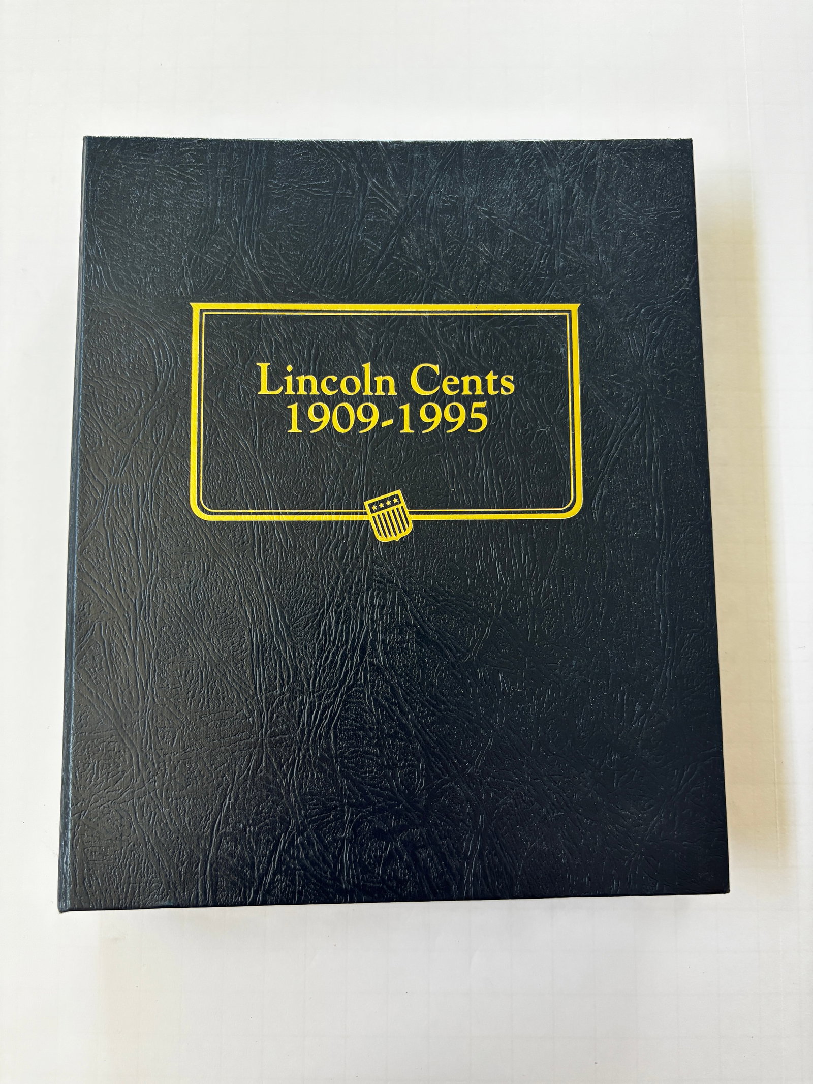 Lincoln Cent Collection Album, 1909–1995, Nearly Complete Multi-Decade Collection: Comprehensive Lincoln Cent collection album covering the years 1909–1995. The album contains a substantial run of Lincoln cents spanning the Wheat Cent and Memorial Cent eras, with examples from Phi