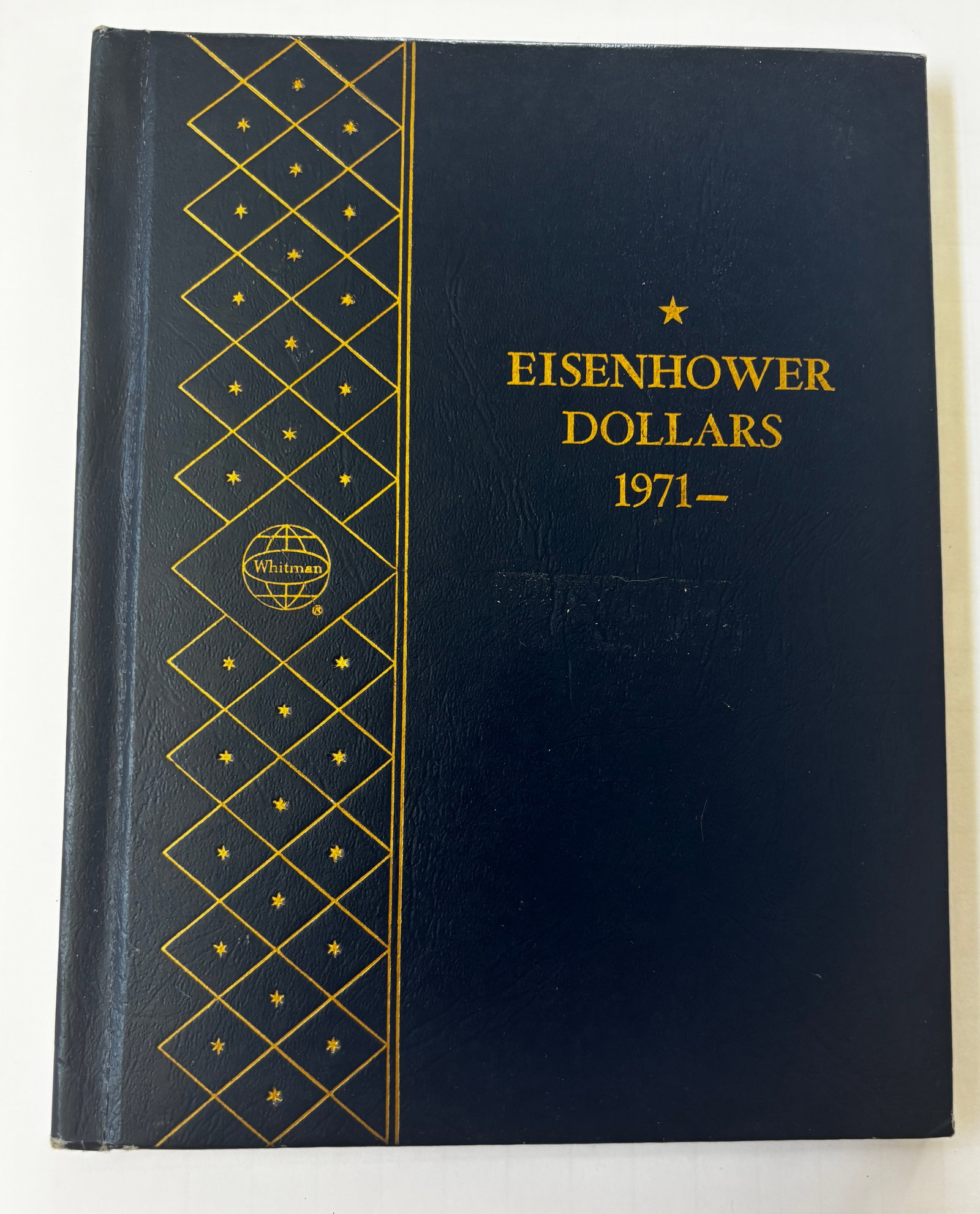 Whitman Eisenhower Dollars Album, 1971–1978, Partially Filled Collection: Whitman Eisenhower Dollars album containing a substantial partial collection of Eisenhower dollar coins dated 1971 through 1978. The album includes multiple Philadelphia, Denver, and San Francisco iss