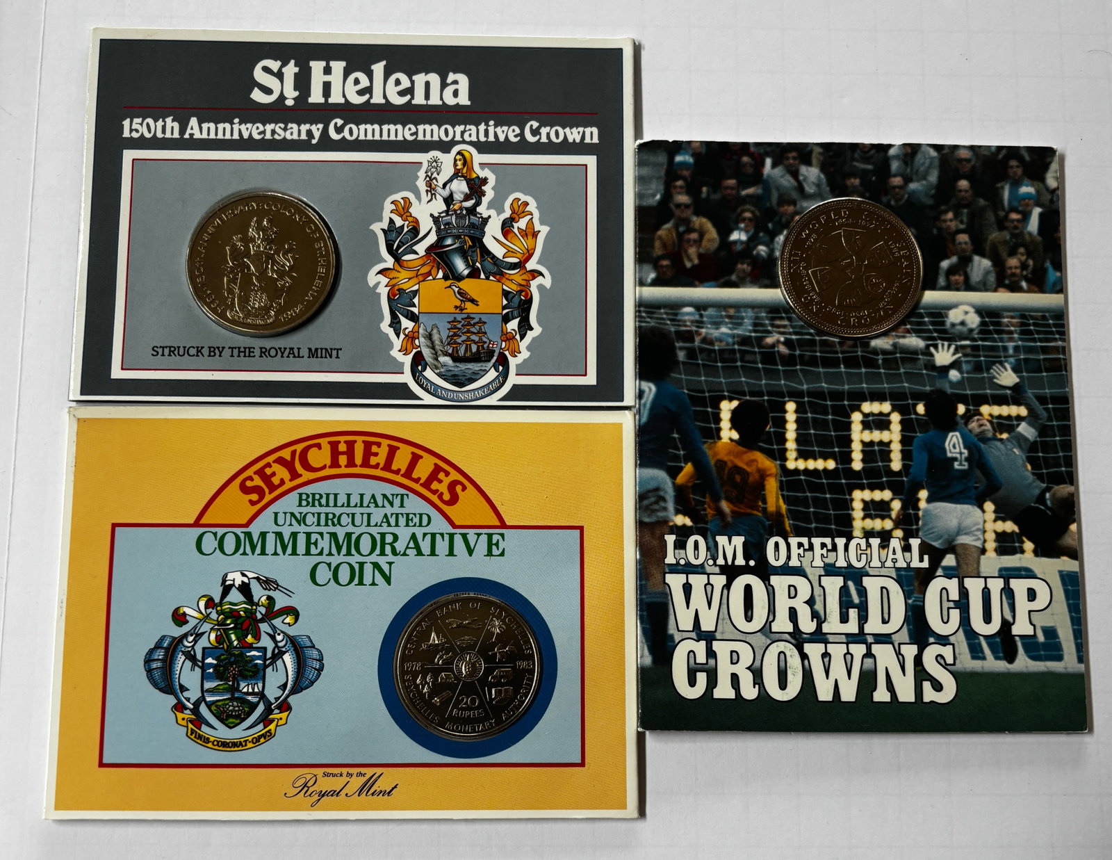 Three Commonwealth Commemorative Crown Coins Including St. Helena, Seychelles, and World Cup (1 of 2)