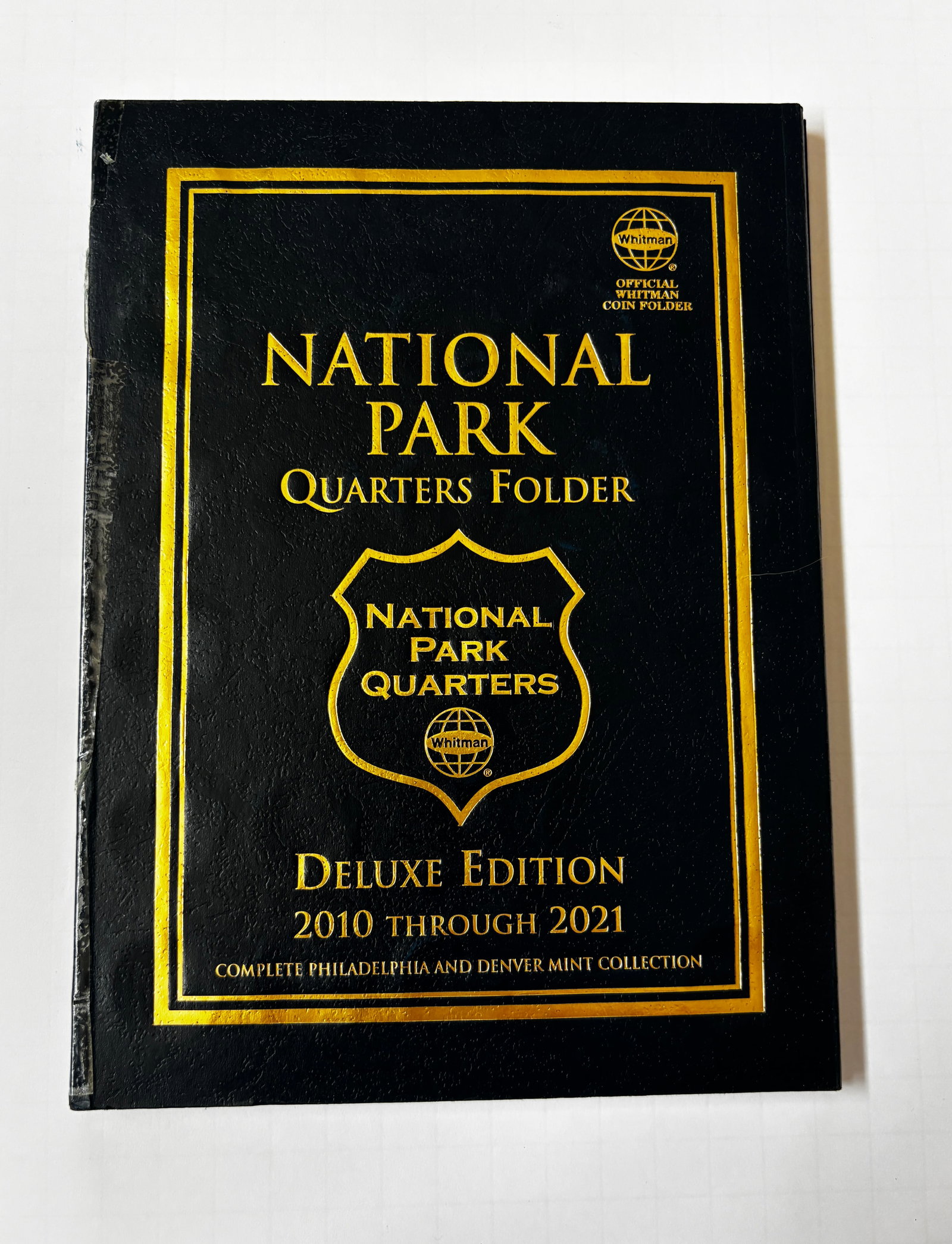 Whitman National Park Quarters Collection Album, 2010–2017, Partially Filled: Whitman National Park Quarters Deluxe Edition album covering the America the Beautiful quarter series from 2010 through 2021. The collection contains a substantial run of Philadelphia and Denver Mint 