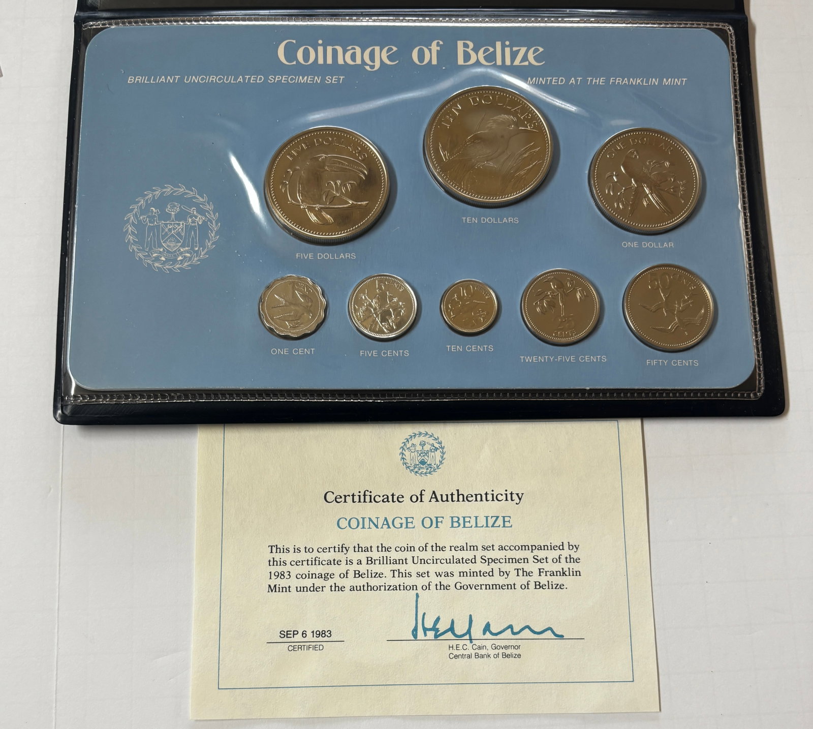 1983 Belize Brilliant Uncirculated Specimen Coin Set with Certificate: 1983 Belize Brilliant Uncirculated Specimen Set minted by the Franklin Mint under authorization of the Government of Belize. Eight-coin set featuring native bird designs and denominations from 1 cent 