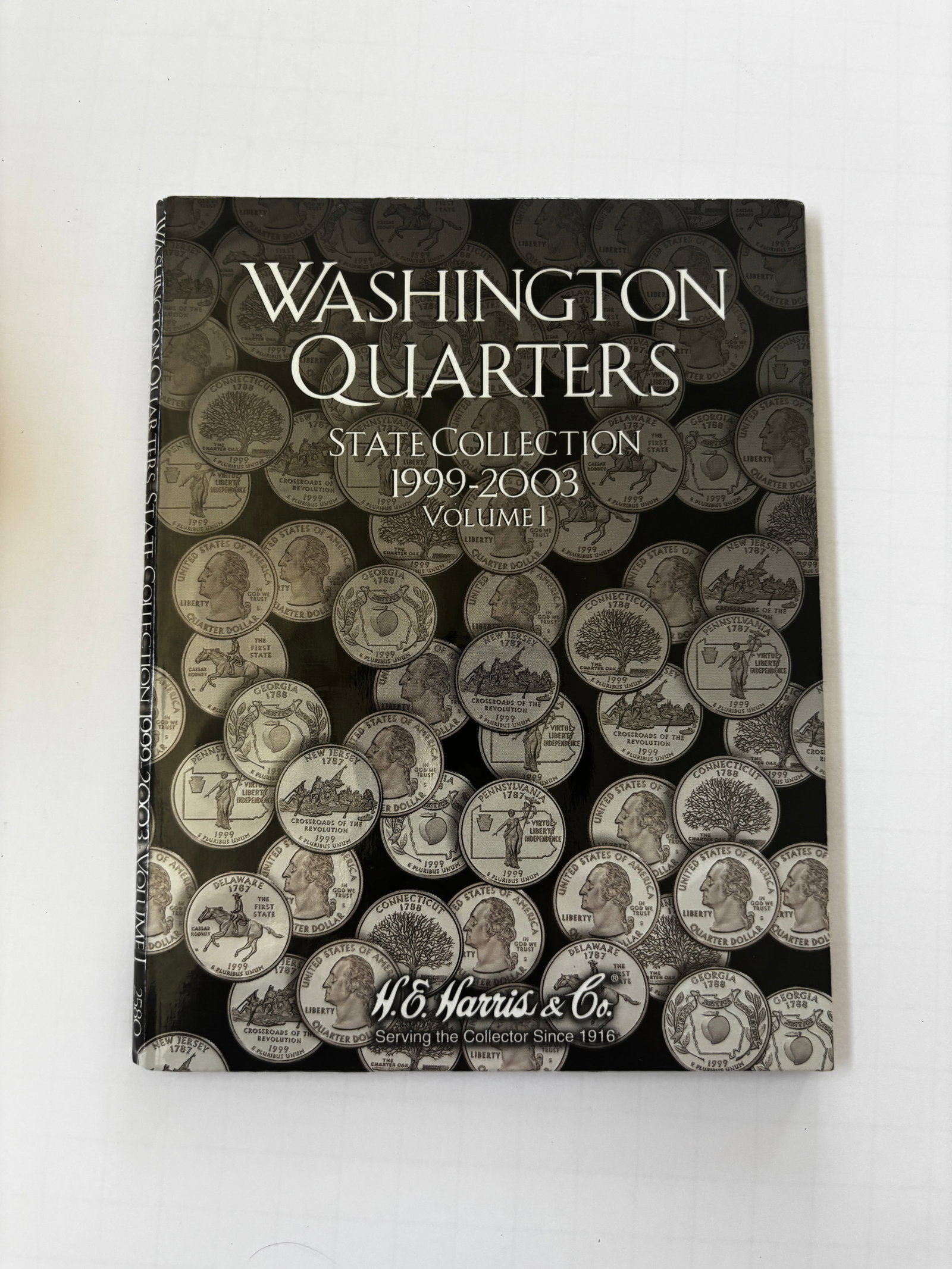 H.E. Harris Washington State Quarters Collection Album, 1999–2003, Partially Filled (1 of 5)