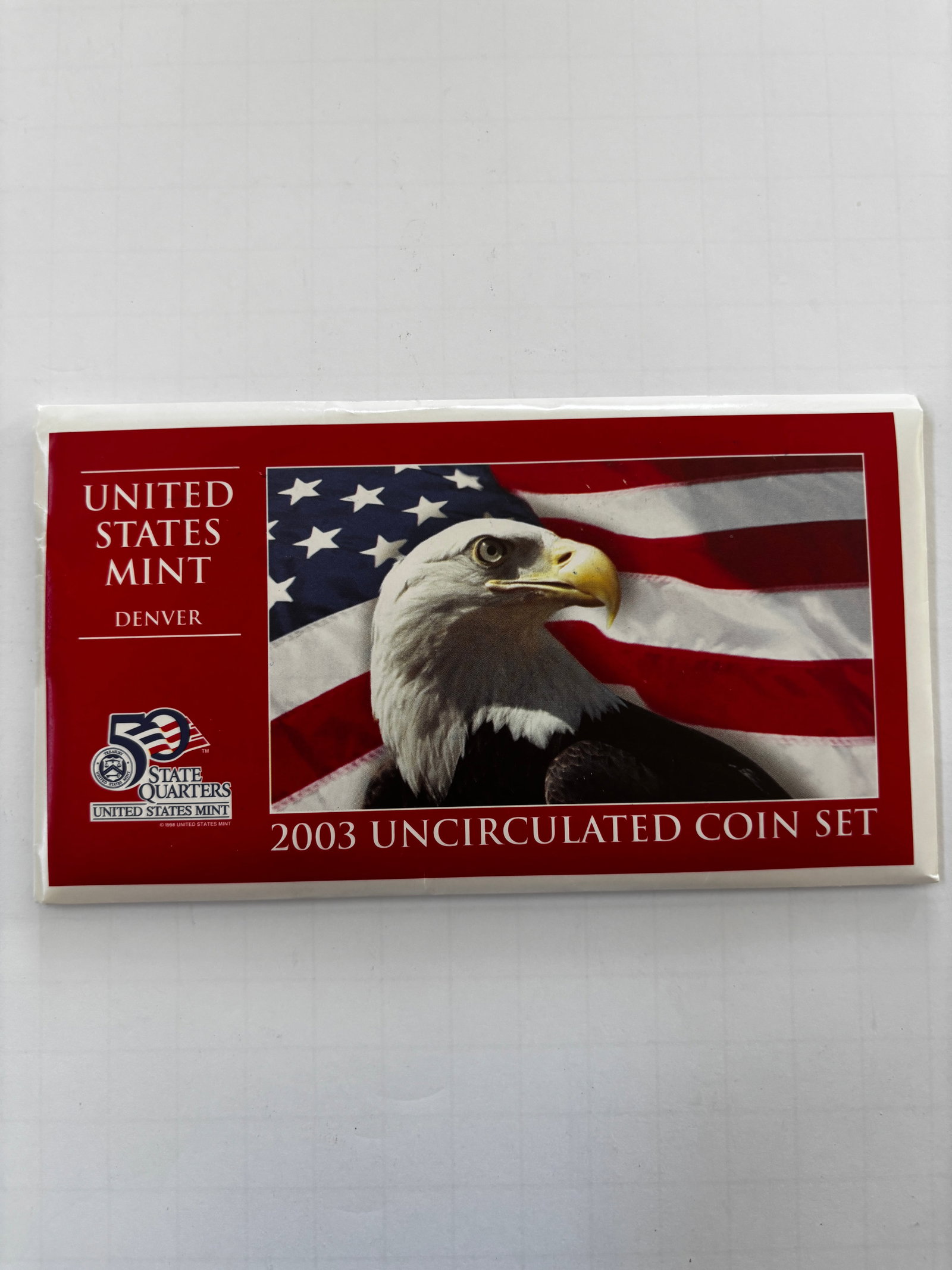 2003 United States Mint Denver Uncirculated Coin Set with Certificate of Authenticity: Official 2003 United States Mint Denver Uncirculated Coin Set housed in its original government packaging with Certificate of Authenticity. The set includes Denver Mint examples of the Lincoln cent, J