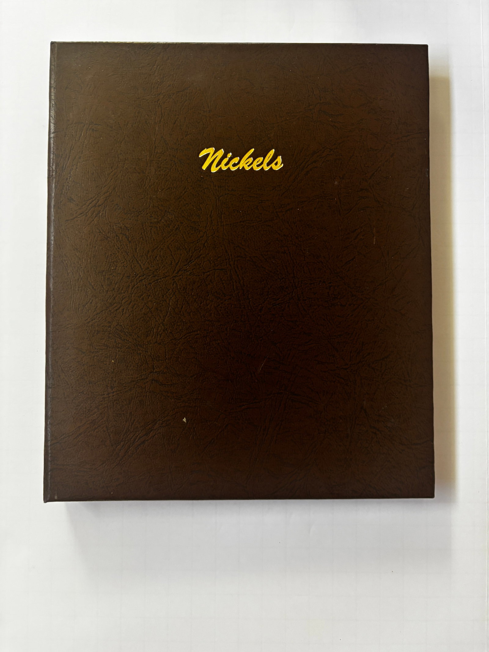 Jefferson Nickel Collection Album, Partial Modern Date Set: Collector album containing a partial assortment of modern Jefferson nickels. The collection includes multiple Philadelphia and Denver Mint issues from the early 21st century and is housed in a brown d