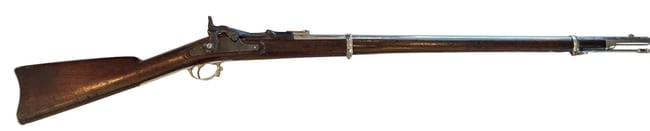 U.S. Springfield Model 1870 Trapdoor Military Rifle SN 29135: U.S. Springfield Model 1870 Trapdoor single-shot military rifle, serial number 29135. Lock is dated 1870. Full-length military configuration with cleaning rod, military rear sight, barrel bands, and s
