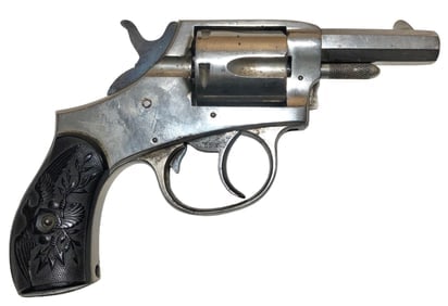 American Bulldog Spur Trigger Revolver Nickel Finish: American Bulldog spur trigger revolver featuring nickel finish, bird’s head grip with embossed eagle motif hard rubber grips, and top strap marked “American Bulldog,” a classic late 19th to 