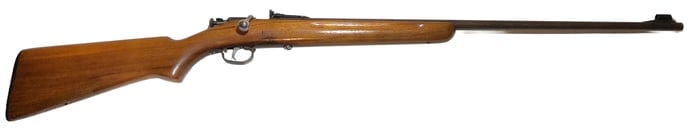 Winchester Model 68 .22 Bolt-Action Rifle Long And Long Rifle: Winchester Model 68 bolt-action rifle, made in New Haven, Connecticut, U.S.A., chambered in .22 Short, Long, and Long Rifle, featuring blued barrel, walnut stock, and original open sights, with classi
