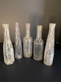 Antique Condiment & Decorative Bottles (5) Dodson Braun’s Table Sauce, Red Snapper, Swirl & Ribbed: Lot of five (5) antique glass bottles ranging from approximately 8 inches to 8 1/2 inches high.
