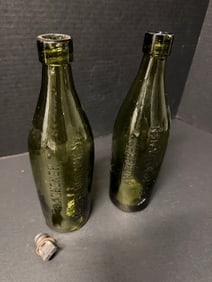 AACHENER KAISERBRUNNEN Embossed German Green Mineral Water Bottles c.1890s 11–11½in Screw: Pair late 19th c. German green glass mineral water bottles embossed AACHENER KAISERBRUNNEN, one internal screw thread with original metal cap (11½in with cap), one applied lip example (approx 1