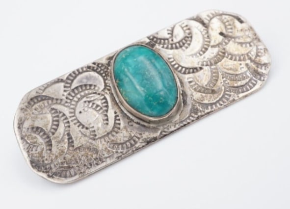 Vintage Navajo Turquoise Brooch Sterling Silver Hand Signed 1.9” OS635: This beautiful signed brooch features a stunning cabochon turquoise stone bezel set in solid sterling silver decorated with a hand stamped design. A great addition for any collector of Native American
