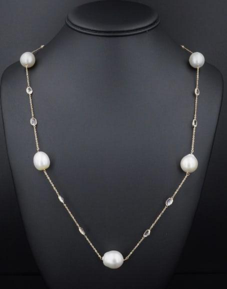 14k Gold South Sea Pearl Necklace White Topaz Station Baroque 36" 15mm NG1359: This beautiful necklace features stunning baroque South Sea pearls alternating with sparkling white topaz stations creating a chunky statement strand. A truly eye-catching and very wearable statement