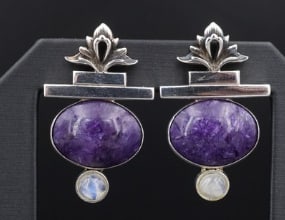 Tricia Young Charoite Moonstone Drop Earrings Sterling Silver 1.5" ES2750: These lovely earrings from designer Tricia Young feature a large charoite gemstone bezel set beneath a modernist bar shape with an intricate fleur de lis design. With a moonstone cabochon at set at th
