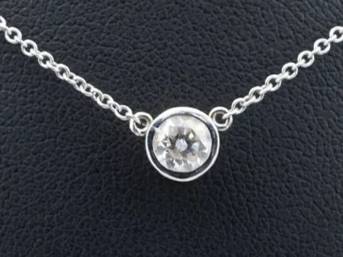 14k White Gold 0.4ct Natural Diamond Solitaire Pendant Necklace 16" NG447: This gorgeous necklace centers on a brilliant 0.40 carat diamond solitaire fixed pendant, bezel-set in solid 14k white gold, and suspended elegantly from a 14k white gold chain. The bezel has a pierce