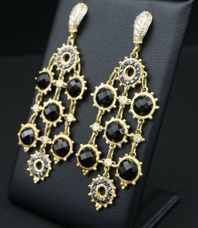1.5ct Judith Ripka 18k Yellow Gold White Black Diamond Dangle Earrings EG1653: These statement earrings are a luxe mixture of textured circles with faceted onyx and black diamonds. Its mesmerizing concentric design, dangling from a pave white diamond top and more diamond accents