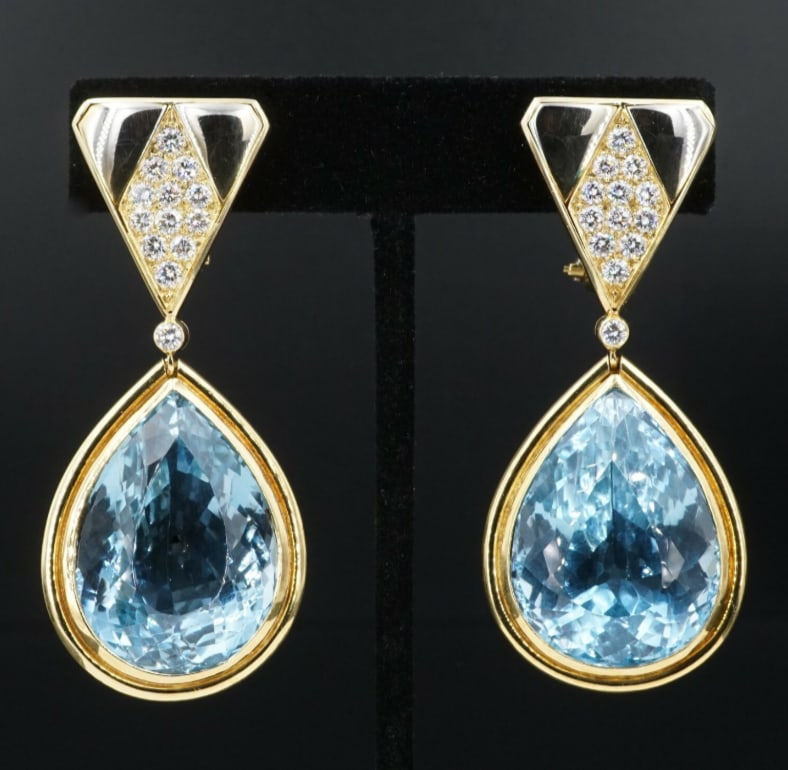 Signed Antoniazzi Chiappe 18k Gold 135ct Blue Topaz Diamond Earrings 2.25 EG1825: These stunning earrings are a beautiful blend of the talent and craftsmanship of design house, Antoniazzi Chiappe. The earrings incorporating massive pear cut blue topaz set below a triangle of yellow