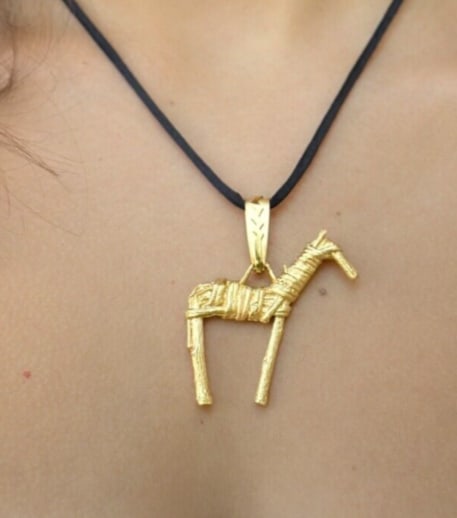 Artisan Charles Supplee Hopi 14k Yellow Gold Twig Horse Pendant PG1713: This beautiful pendant is a recreation of a twig horse created by a Native American hunter over 4,000 years ago. Hopi artist Charles Supplee has recreated this wood twig horse and then cast it into so