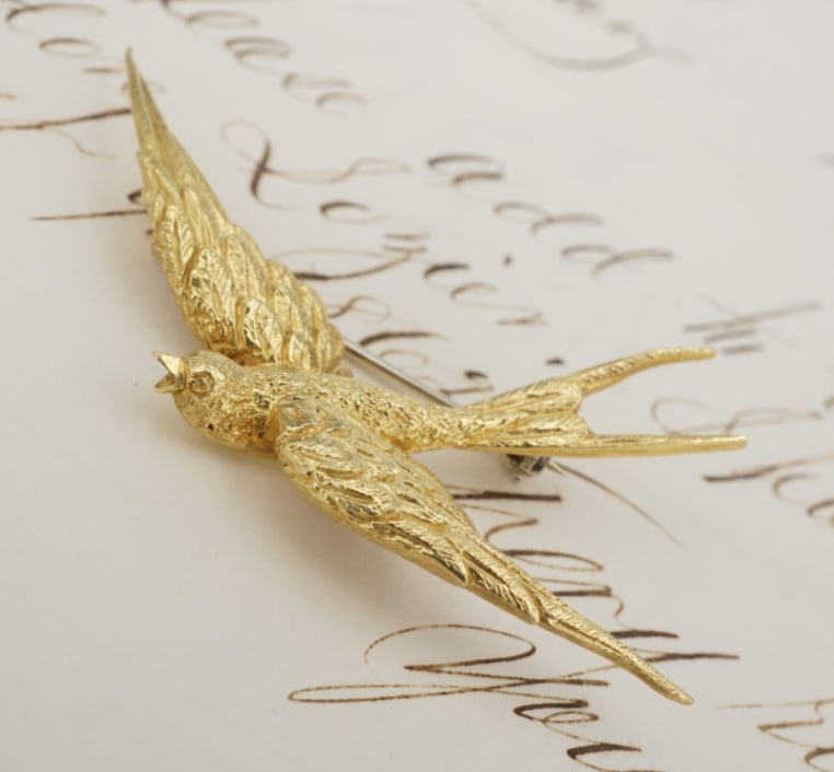 18k Vintage Swallow Pin Bird Brooch Yellow Gold 2" Symbolic OGXXX: This beautiful vintage brooch features a detailed swallow, a timeless symbol of loyalty, hope, and safe return. The carved eyes, the tiny beak, and the incredibly textured feathers all make for an exq