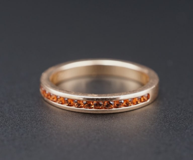 14k Vintage Orange Garnet Half Eternity Band Ring Gold Size 5 Stacker RG4777: This lovely ring features a classic half eternity design crafted in solid 14k yellow gold and set with a row of vivid orange channel set orange garnets around the entire band. An elegant piece to add