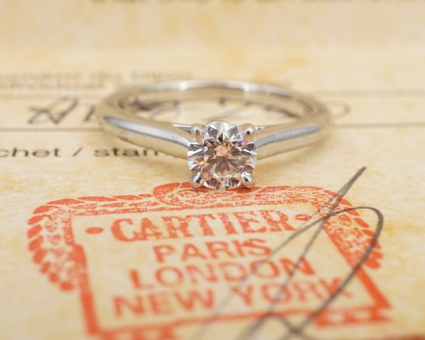 Cartier Diamond Platinum Engagement Ring Solitaire 0.45ct Size 5.25 GIA RG4906: This engagement ring, from Cartier, features a beautiful round brilliant-cut diamond solitaire, prong-set in a solid platinum setting with a luxe polished construction. A classic beauty, highlighted b