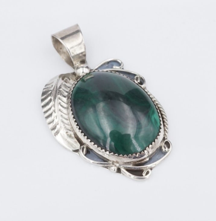 Navajo Sterling Silver Malachite Pendant Cabochon 2" Calvin Tom Large 20g PS2176: This Navajo pendant features a beautiful oval cabochon of malachite with gorgeous whorls and swirls of green. The large tapered bale gives this piece a bold look and accommodates a variety of chains,