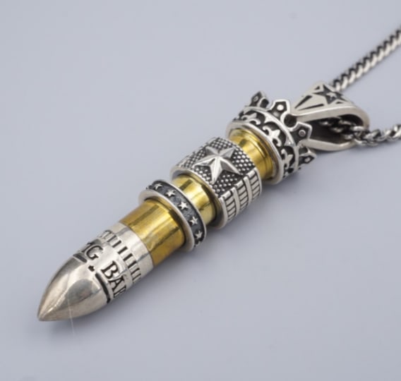 King Baby .38 Special Bullet Sterling Silver Star Flag Pendant Necklace NS2318: King Baby is designed this bullet pendant necklace for jewelry enthusiasts who appreciate value and artisan products. These piece captures the spirit of America with rock n’ roll sex appeal. Metal T