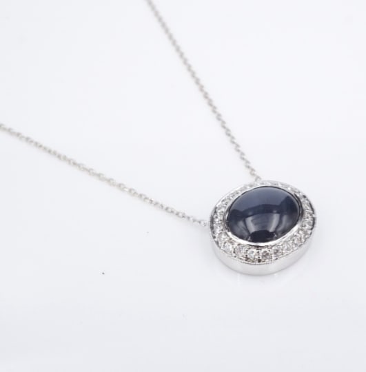 14k Blue Star Sapphire Diamond Halo Pendant Necklace 16" Gold Natural NG1769: This gorgeous vintage necklace features a deep blue natural star sapphire cabochon bezel set in bright 14k white gold with a glimmering diamond halo. Suspended from a supple 14k white gold chain, this
