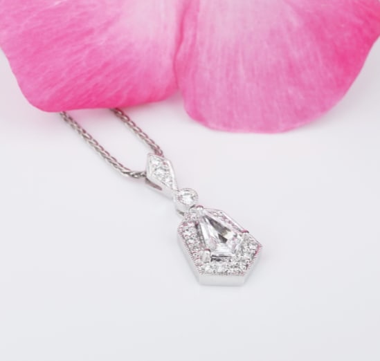Henri Daussi 1ctw Natural Kite Diamond Cluster Pendant Necklace 18" NG1310: This fabulous necklace features a sparkling kite cut diamond cluster set in a teardrop pear-shaped pendant. The pendant slides smoothly on a delicate wheat chain, all crafted of solid platinum. A beau