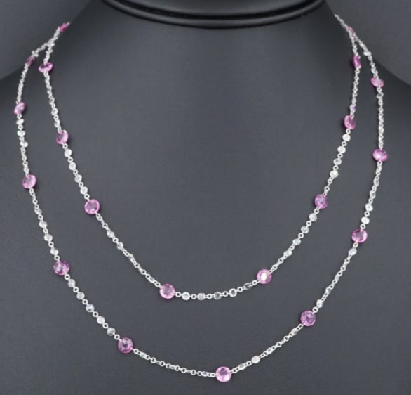 18k Dancing Diamond Station Necklace Pink Sapphire White Gold 36" NG1029: This gorgeous necklace features a sparkling "chain" of bezeless rose cut diamonds, each connected by a tiny loop of 18k white gold skillfully pierced through each stone. Between every fifth diamond is