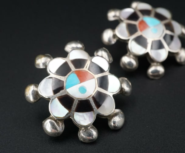 Zuni Sunface Inlay Earrings Sterling Silver Turquoise Pauline Lonjose ES2157: These unique vintage pair of earrings have a sun face inlay with sections of alternating turquoise, coral, onyx and shell insets into the face of each earring. Additional sterling silver bead accents