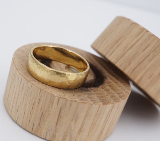 Designer Rigby Leigh 18k Gold Textured Band w/ Casting Box 5.5mm RG5038: Created by goldsmith Rigby Leigh, this band was cast in 18k gold, the natural texture of the Wood Casting and the matching color of the side stones work to create a piece that will never be repeated.